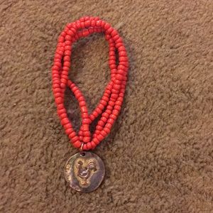 Used world market luck rooster beaded bracelet